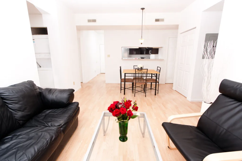 Living room at Campus Oaks Apartments, photo 2 of 8