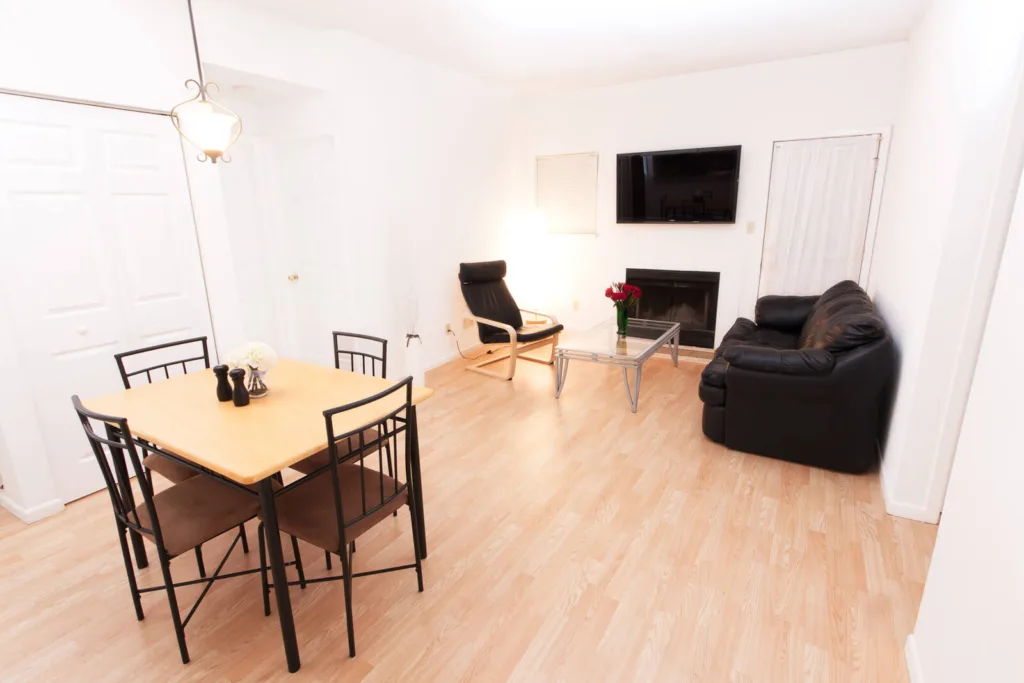 Living room at Campus Oaks Apartments, photo 4 of 8